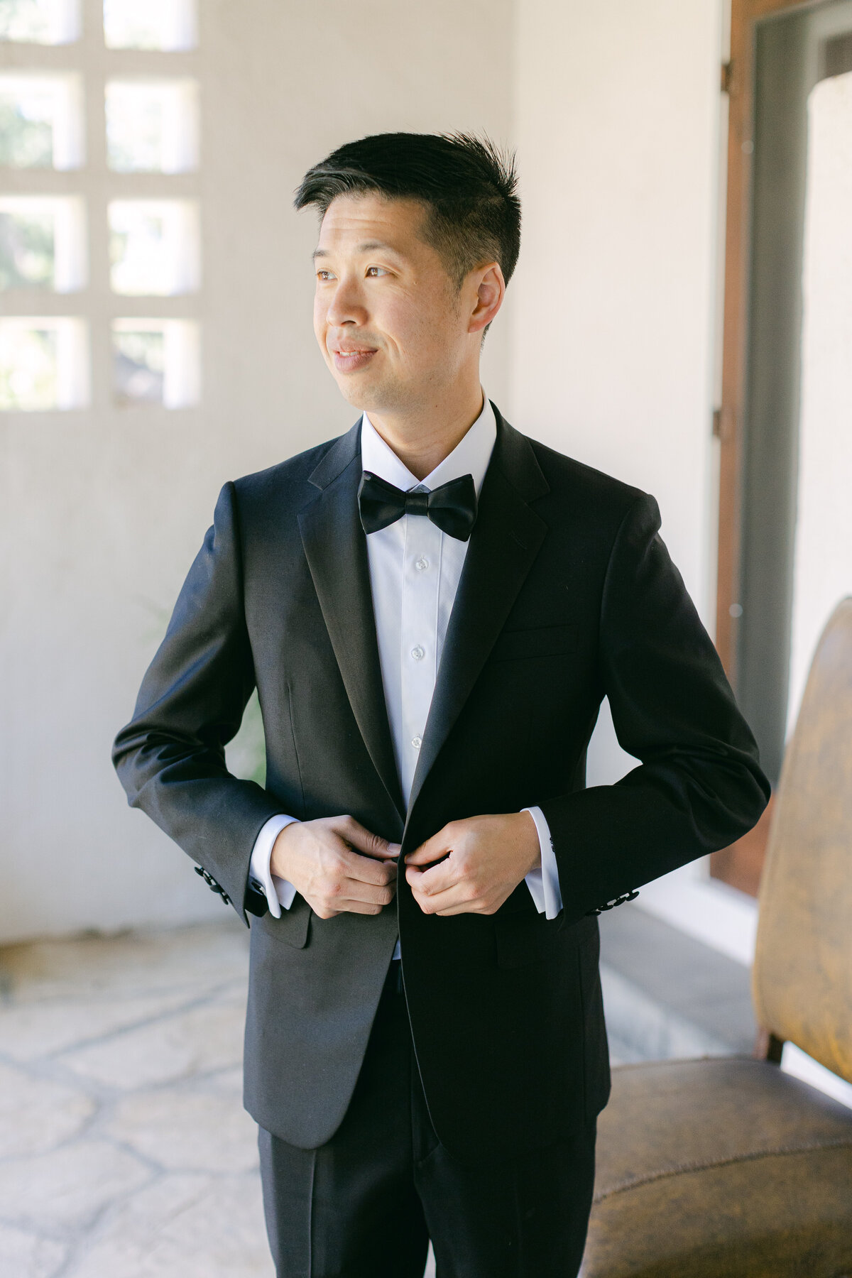 Groom getting dressed in Simi Valley
