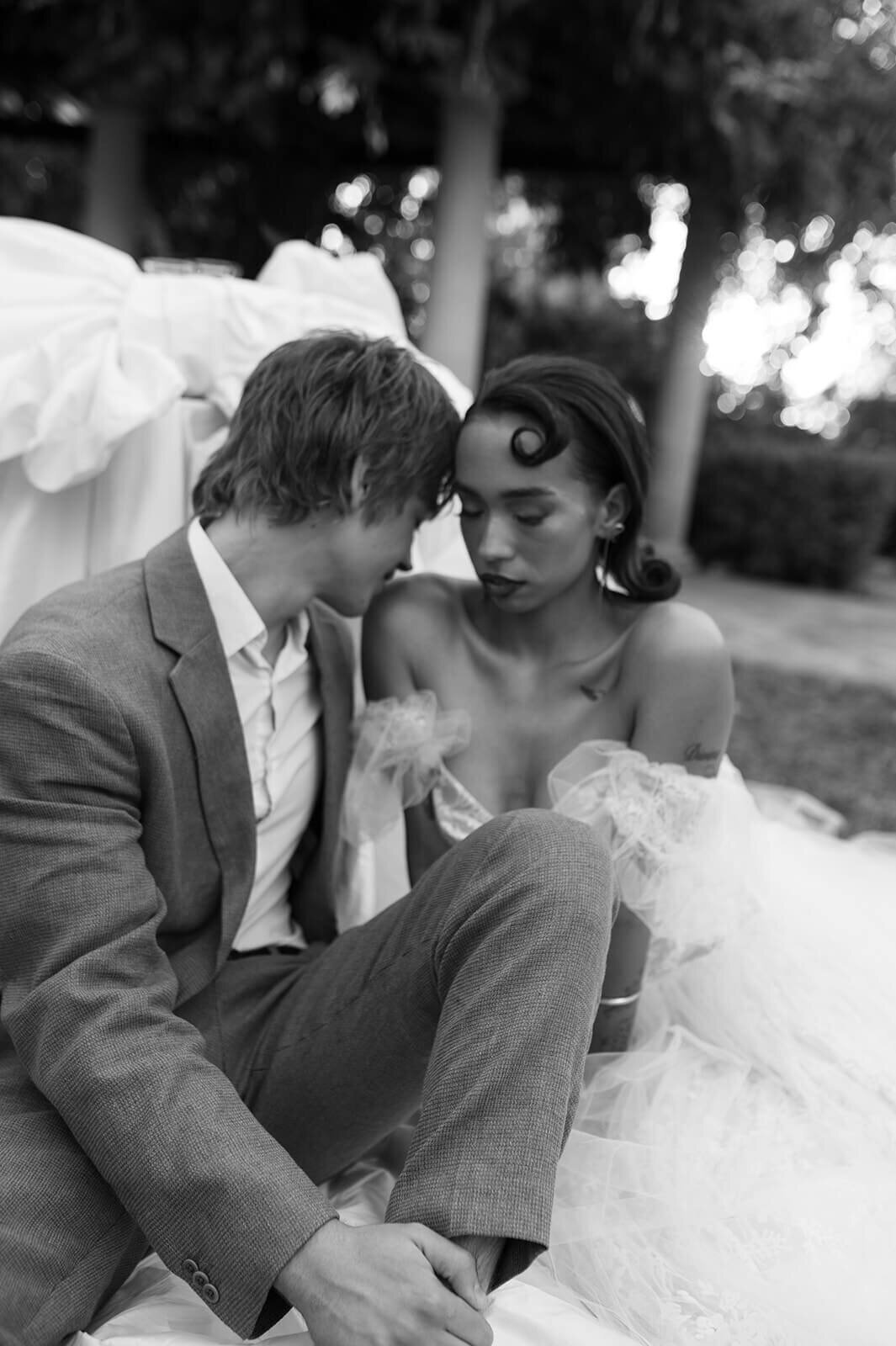 Groom-kiss-brides-shoulder