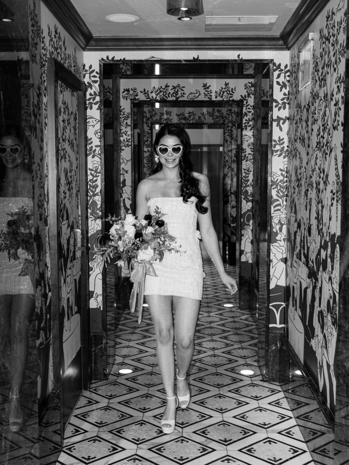 Bride in black and white and sunglasses