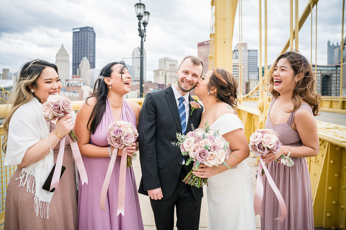 small wedding fun pictures on the yellow bridges
