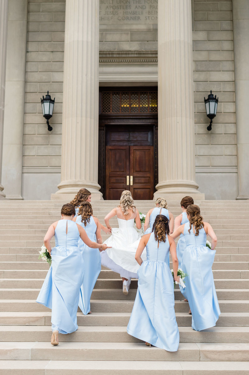 bridesmaids-walking-up-national-city-chrisitian-church