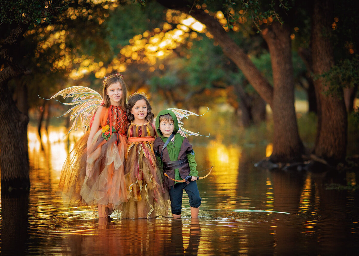 three children fairies in lake