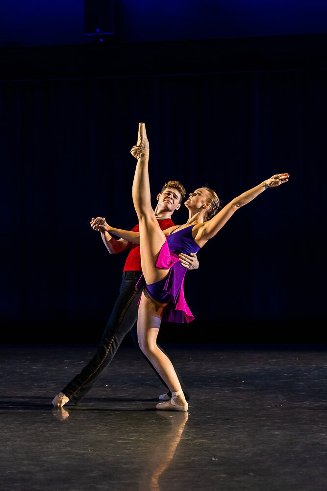Man and woman dancing on stage
