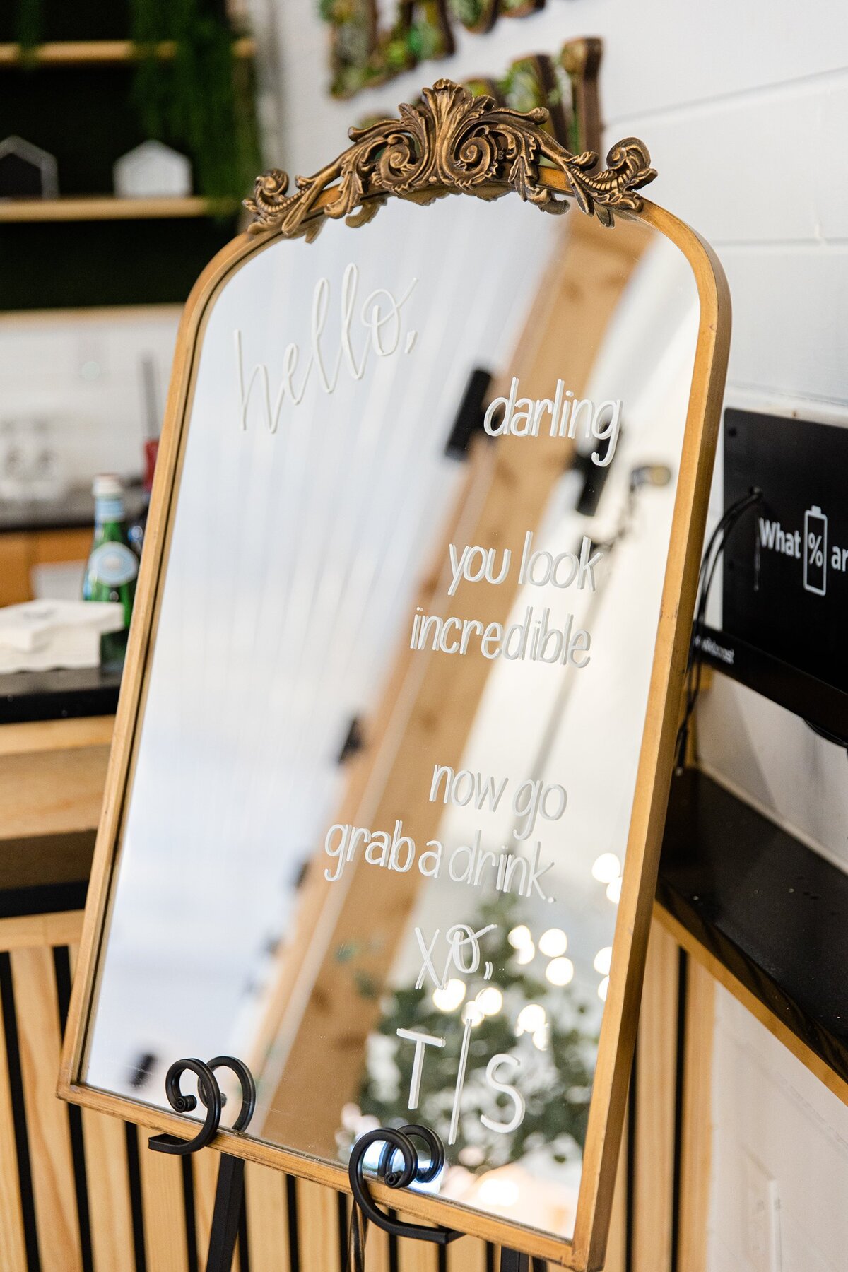 Medium arch mirror with ornate ornament on top with calligraphy for drink sign