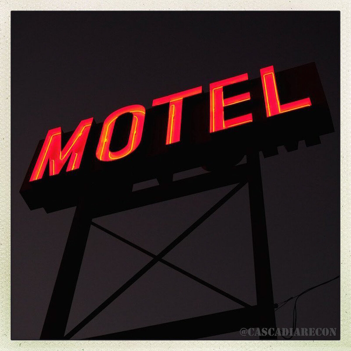 Red motel sign evening view at Celilo