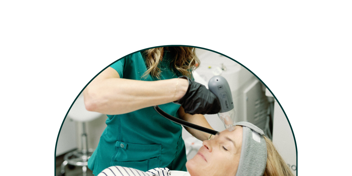 woman receiving laser treatment