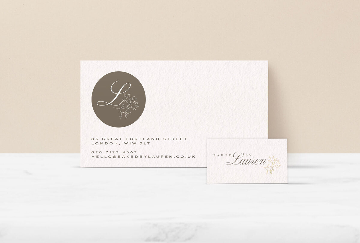 The Baked by Lauren logo and brand mark on two cards
