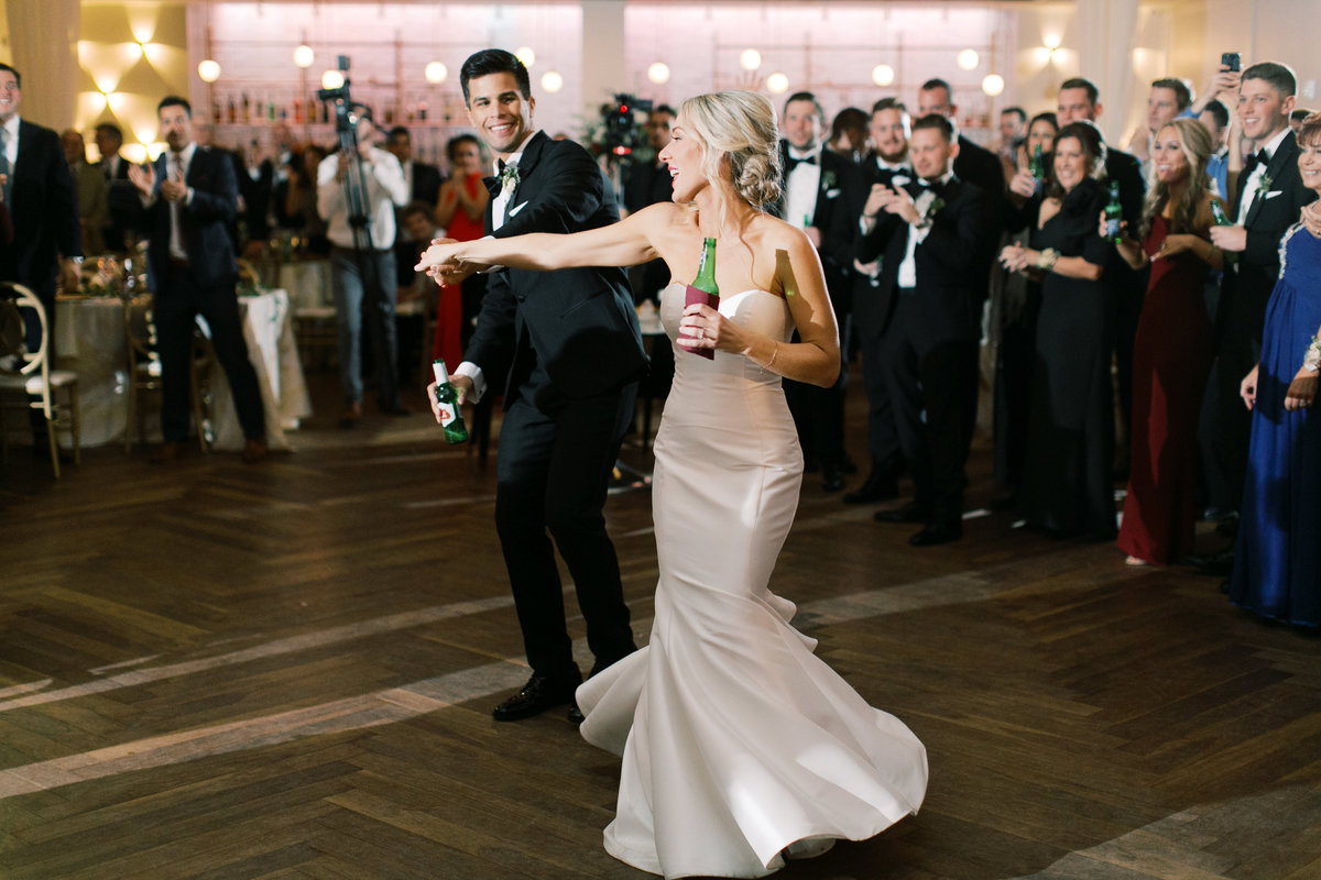 bride and groom dancing during first dance at wedding reception