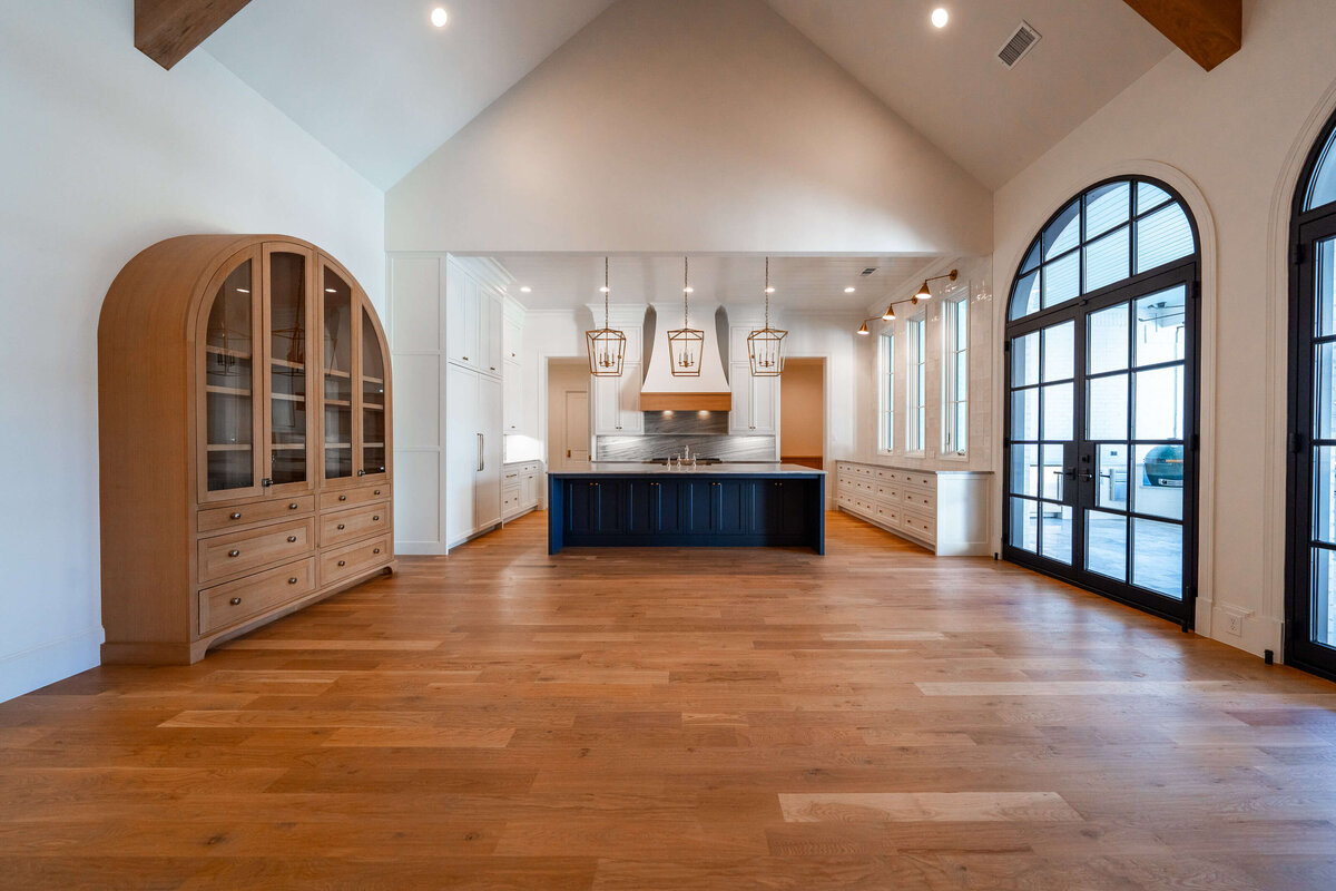 Colleyville custom home with arched windows and custom cabinetry