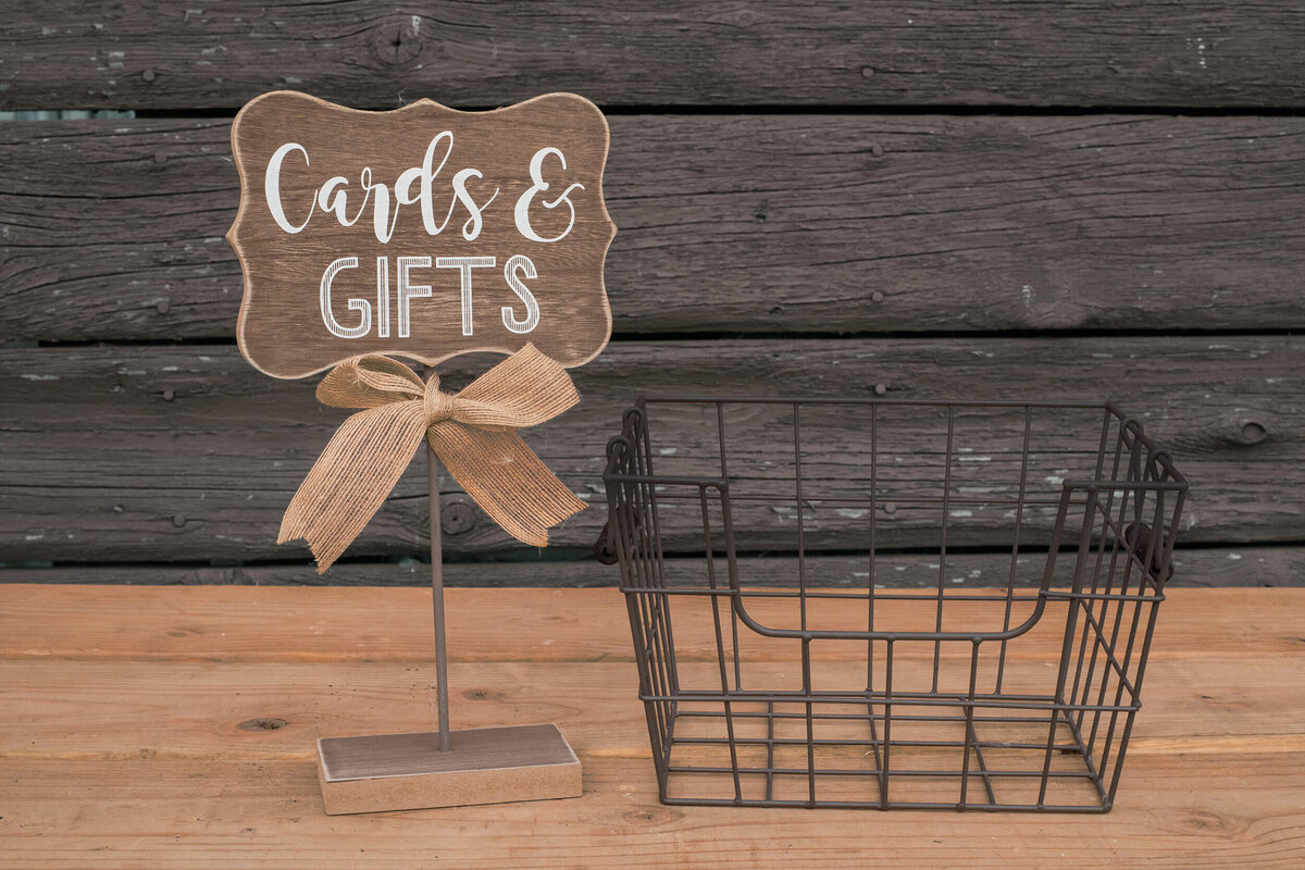 wooden cards and gifts sign with wire basket