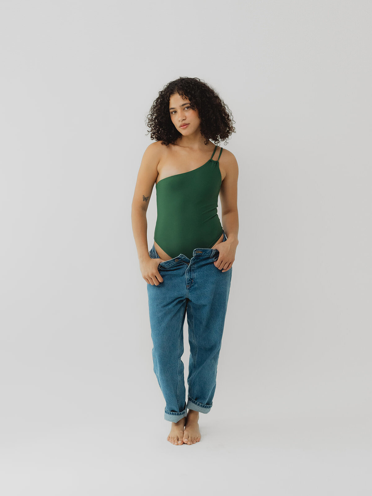woman modeling sustainable swimwear