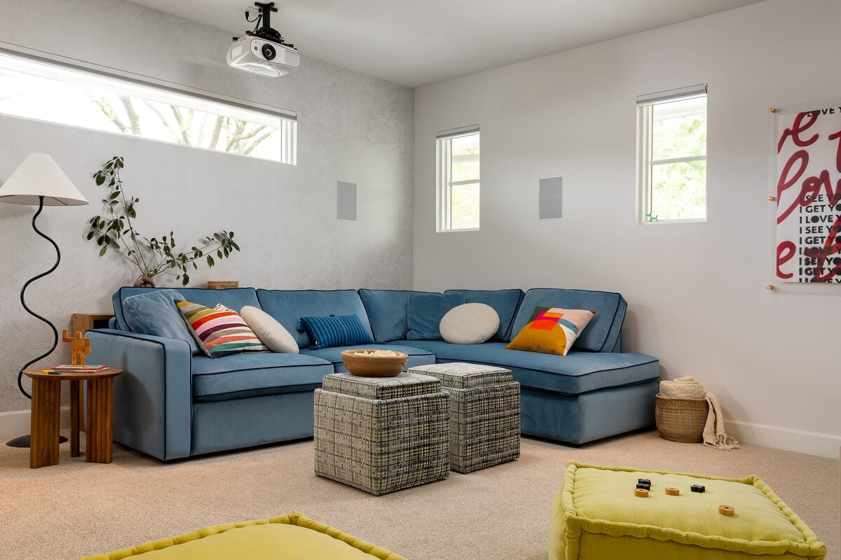 rebekah nicole interiors arbor playroom media room with projector on ceilling