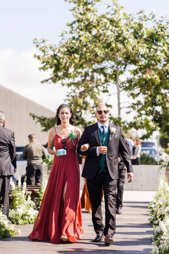 couple-walking-down-aisle