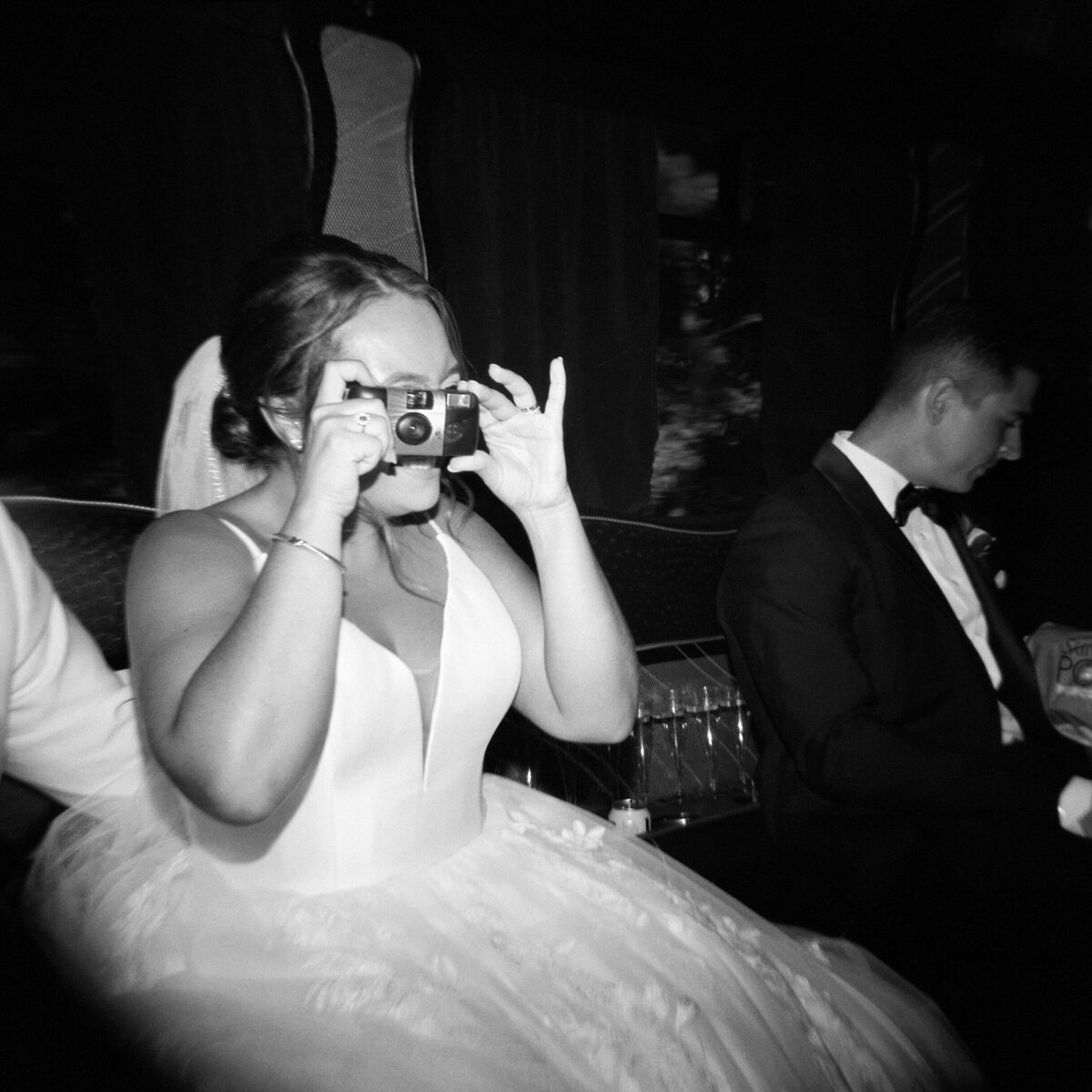 bride-with-disposable-camera