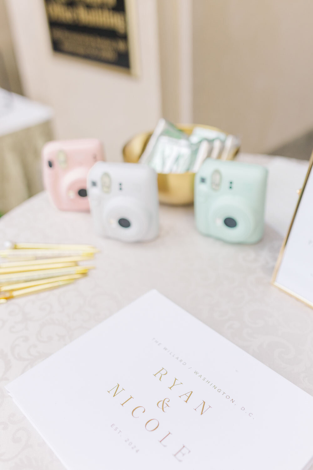Polaroid cameras on guest table for wedding photos