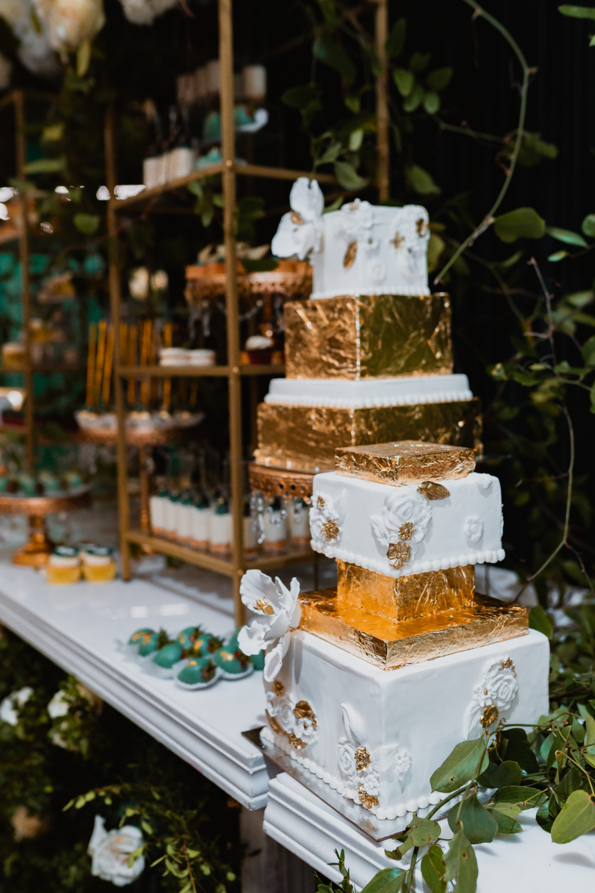 emerald-green-gold-reception-florals-centrepieces-greenery-dessert-bar-cake