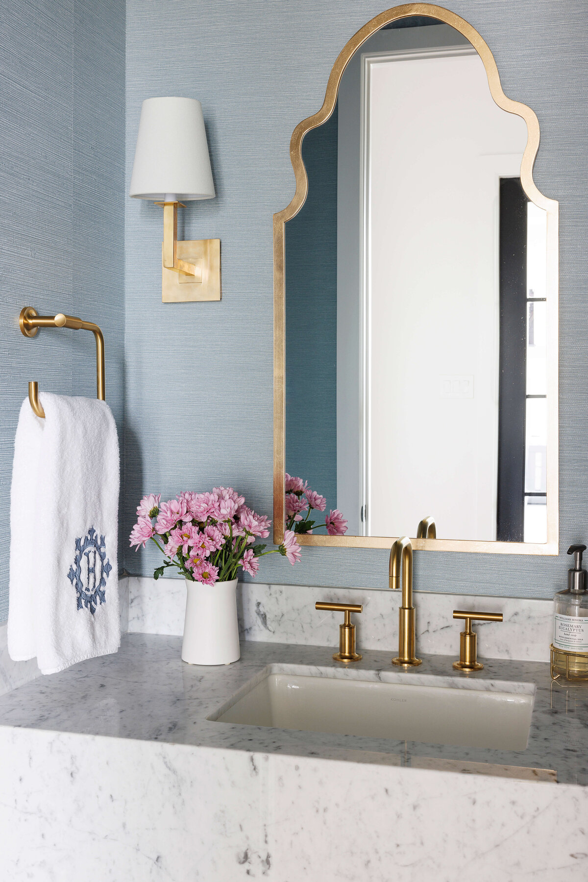 oyster creek studios missouri city new build gold lighting white handtowel marble vanity with gold hardware in bathroom