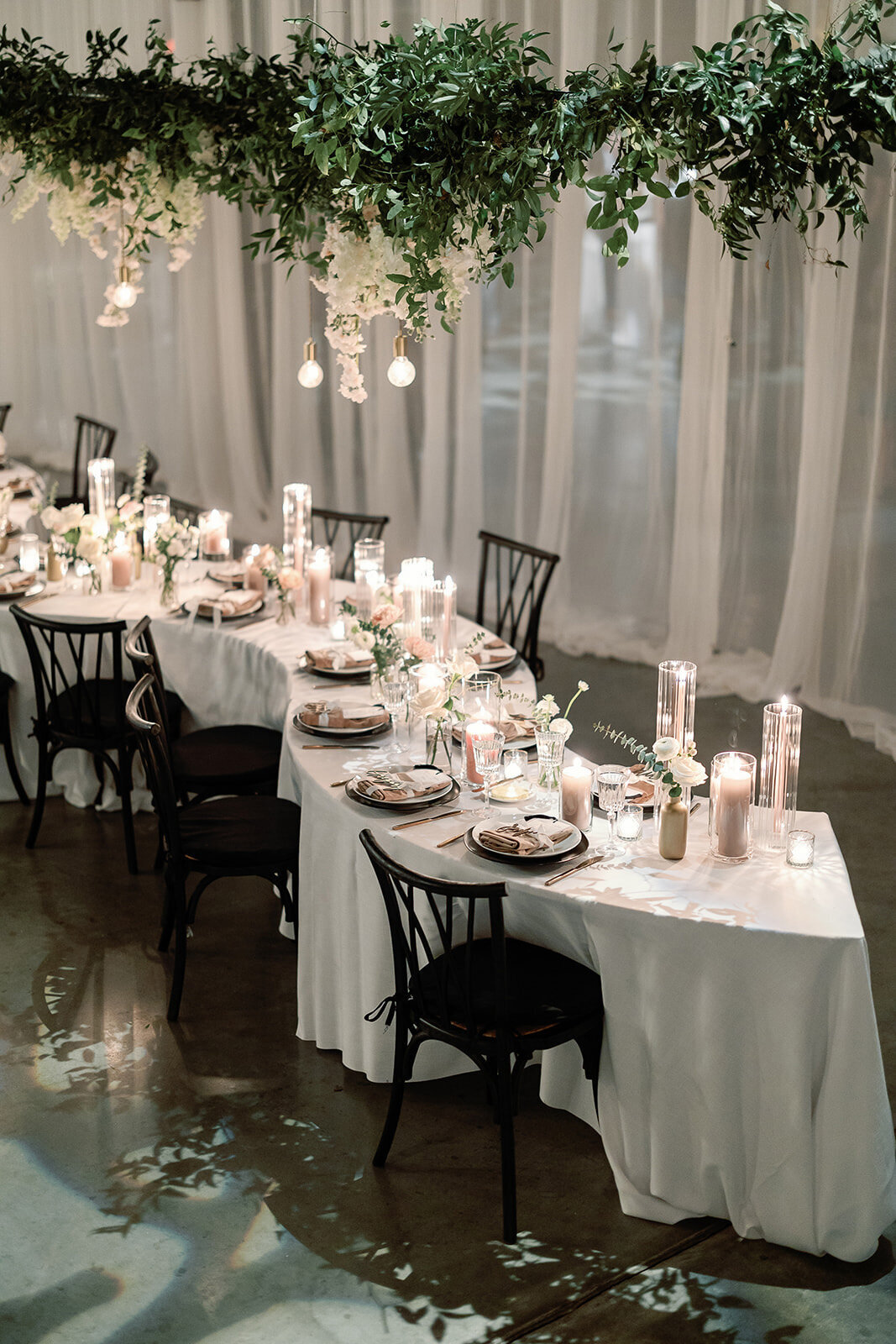 Kate-Murtaugh-Events-warehouse-wedding-planner-serpentine-table-flowers-installation