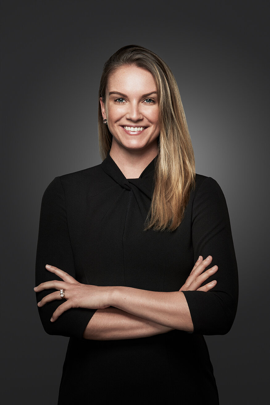Professional portrait of Emily Mason, with a poised and confident stance, shot by Ylva Erevall.