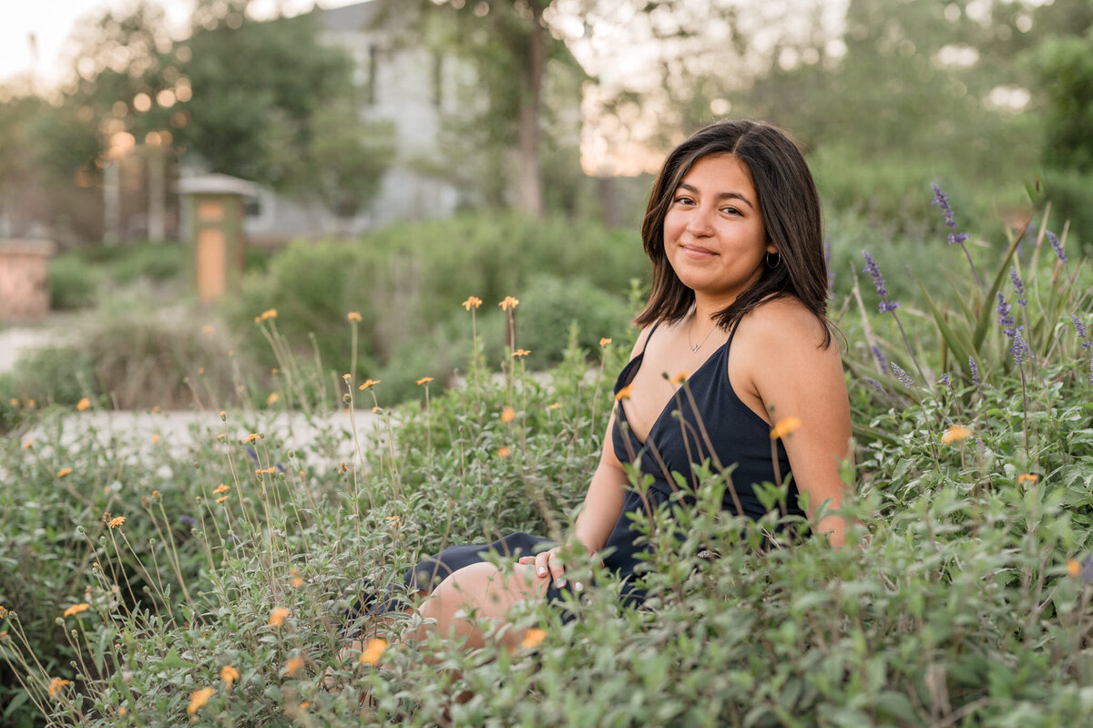 San Antonio senior sits among flowers at Confluence Park pictures.