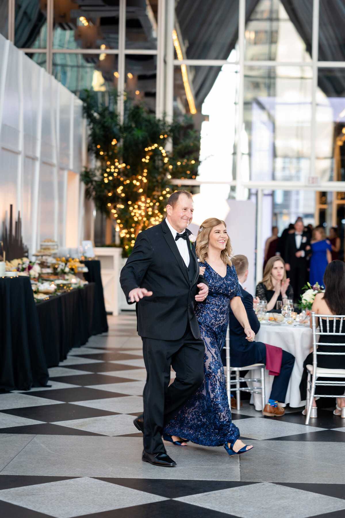 parents being introduced into the wedding reception at wintergarden ppg place