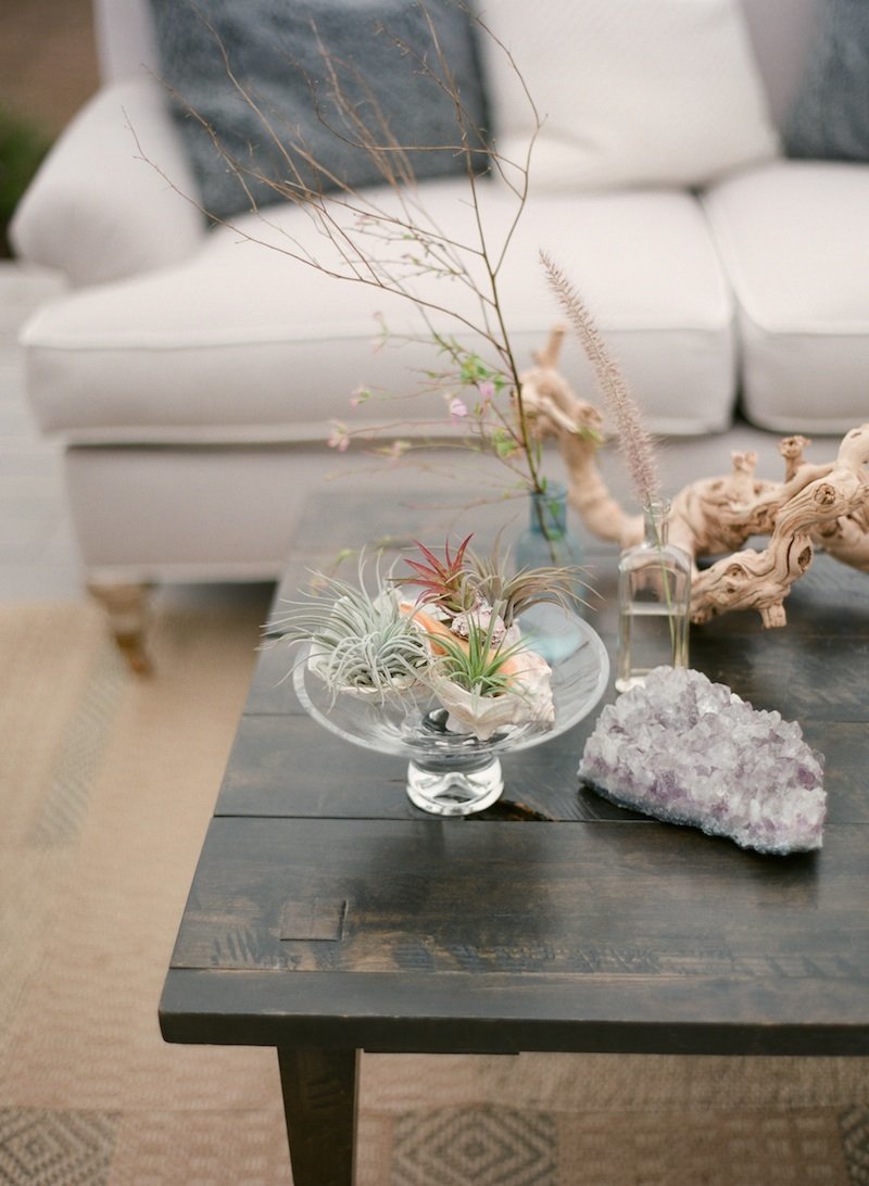 beach items styled on coffee table
