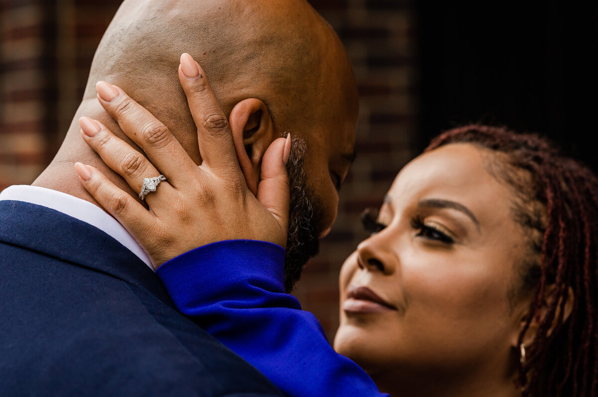 Woman gazing into her fiancé's eyes