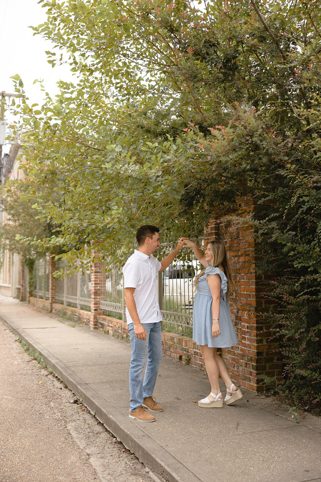 couple-near-trees-downtown-lafayette