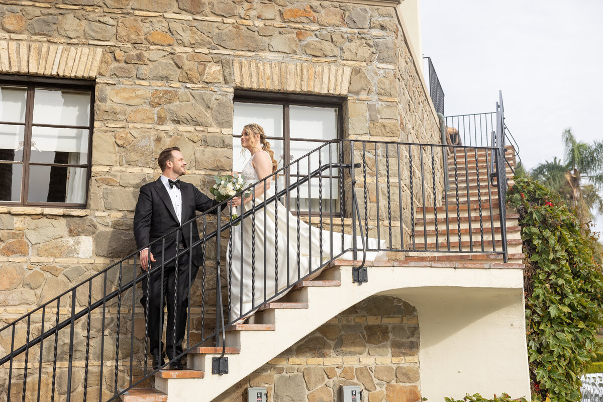 Couple walking down to the garden at Bel Air bay Club