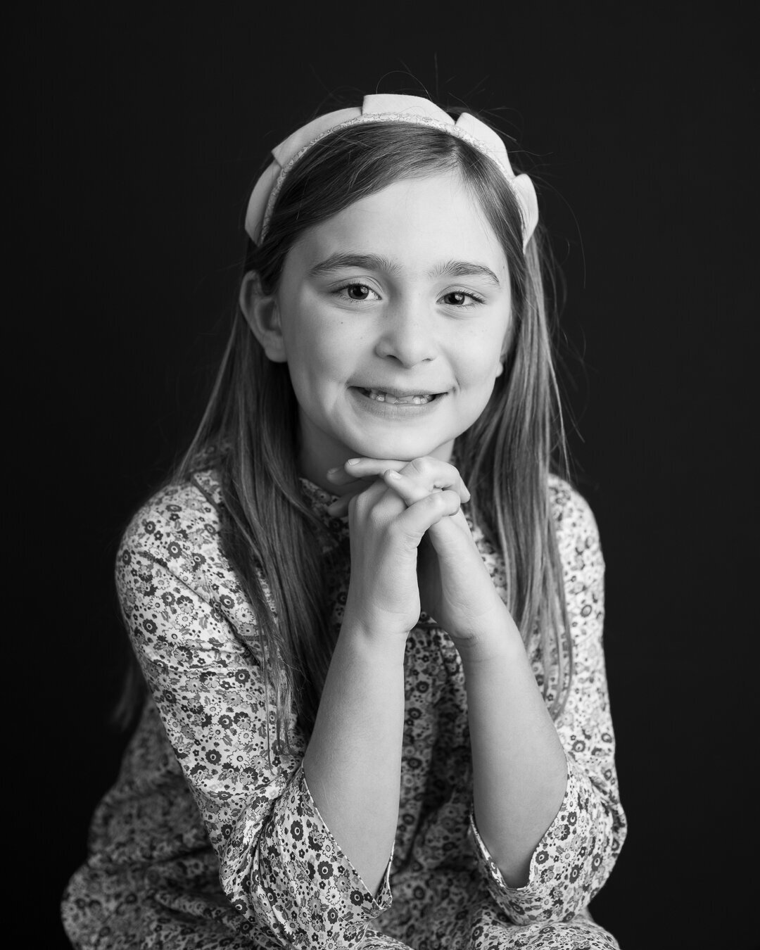 school-portrait-black-and-white-elementary-school-hands-under-chin