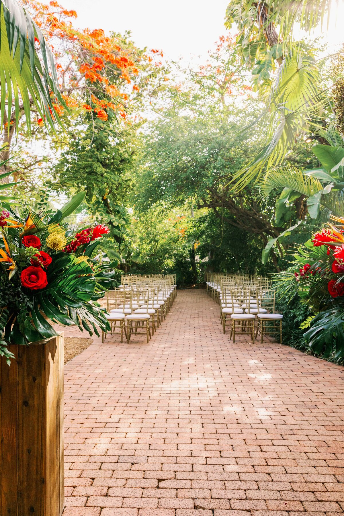 A tropical wedding ceremony at The Hemingway Home in Key West, Florida