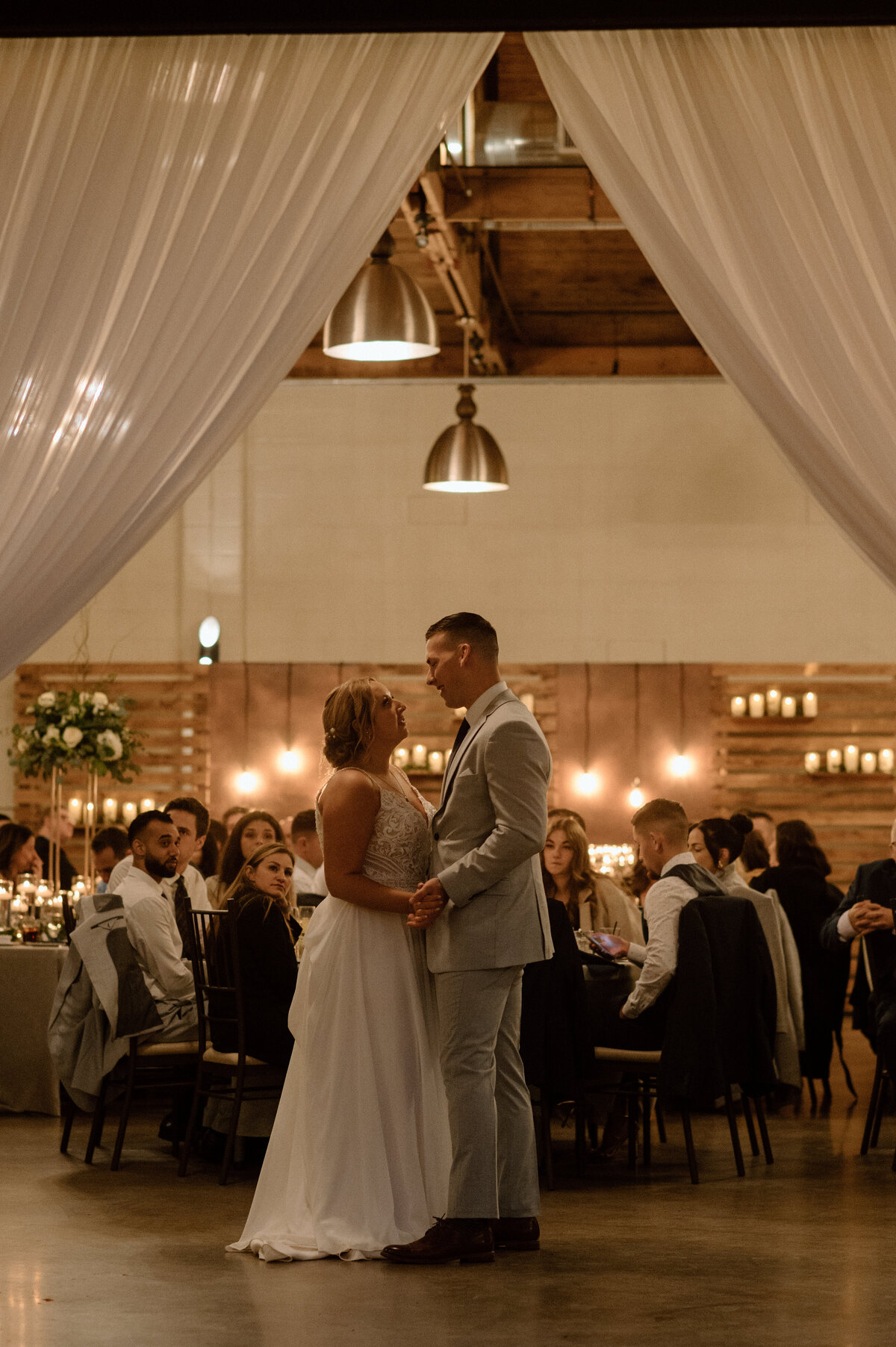 the first dance as guests look on