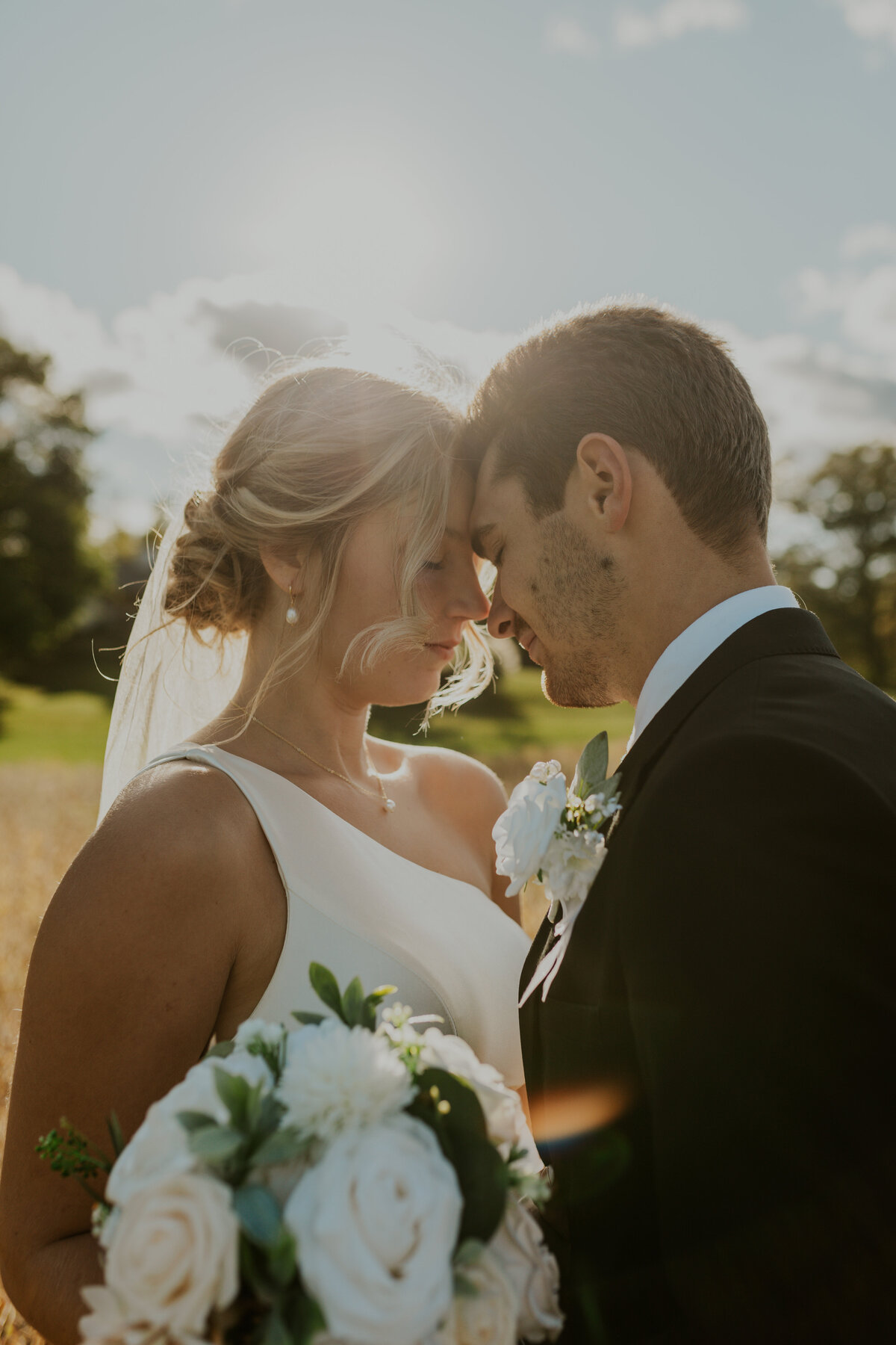 Close-up of a wedding ceremony, bride and groom exchanging rings in Indiana.