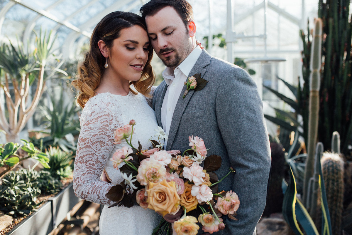 Bride and Groom portrait in the garden elopement of Volunteer Park Conservatory in Seattle Washington