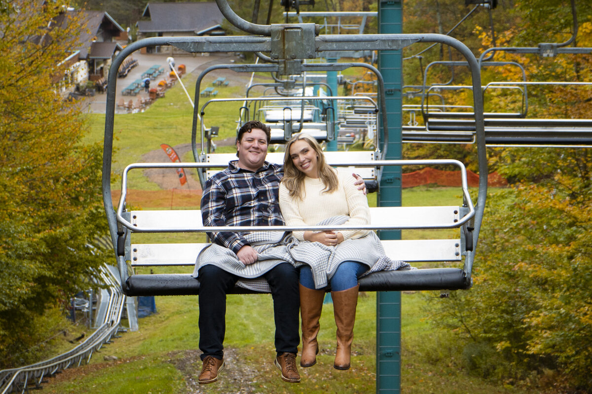 Photo of engaged couple in the fall