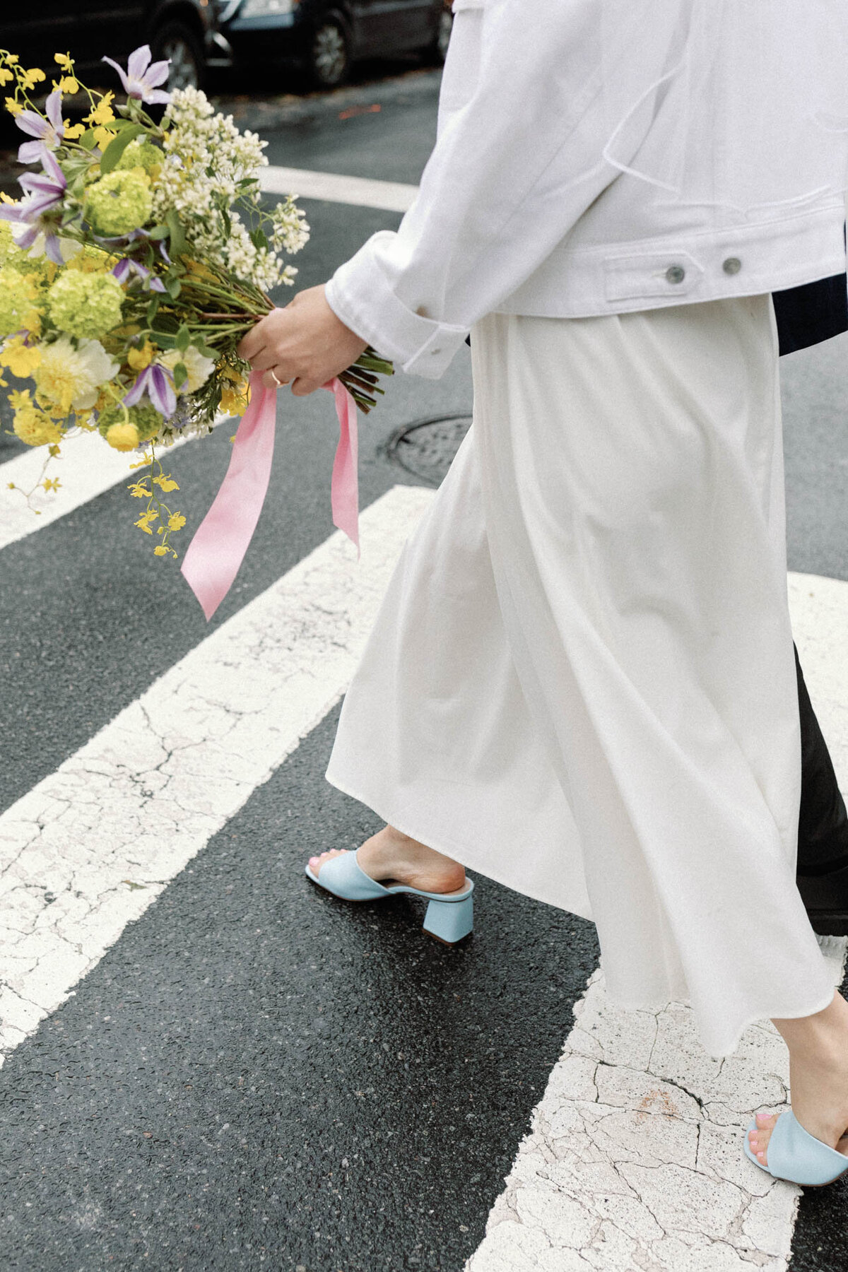 couple crossing the street in fort greene at brooklyn rhodora wine bar wedding