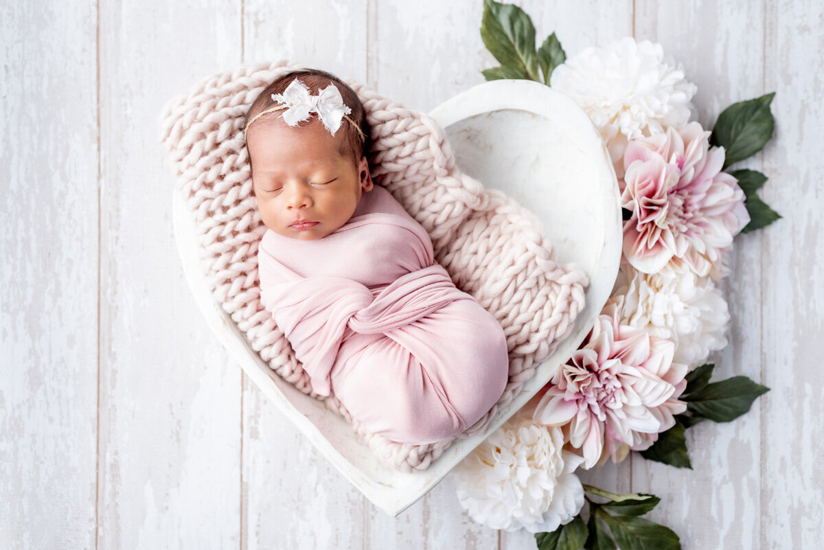 girl-parker-colorado-newborn-in-home-floral-heart-wrapped