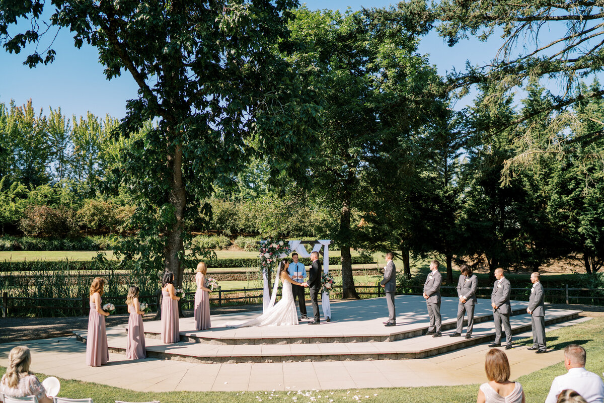 Bride and groom at the altar saying I do.