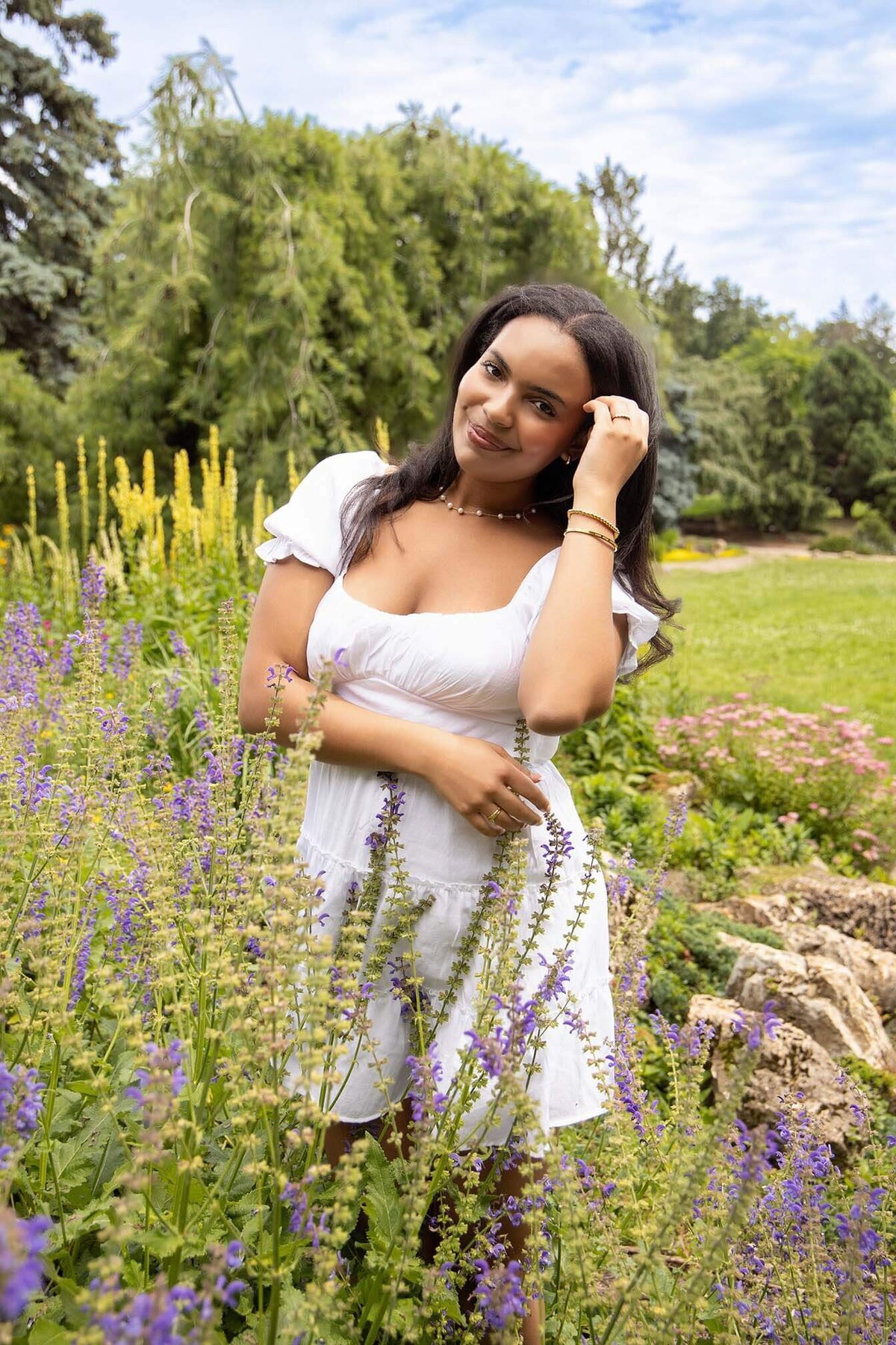 senior-standing-in-the-flowers