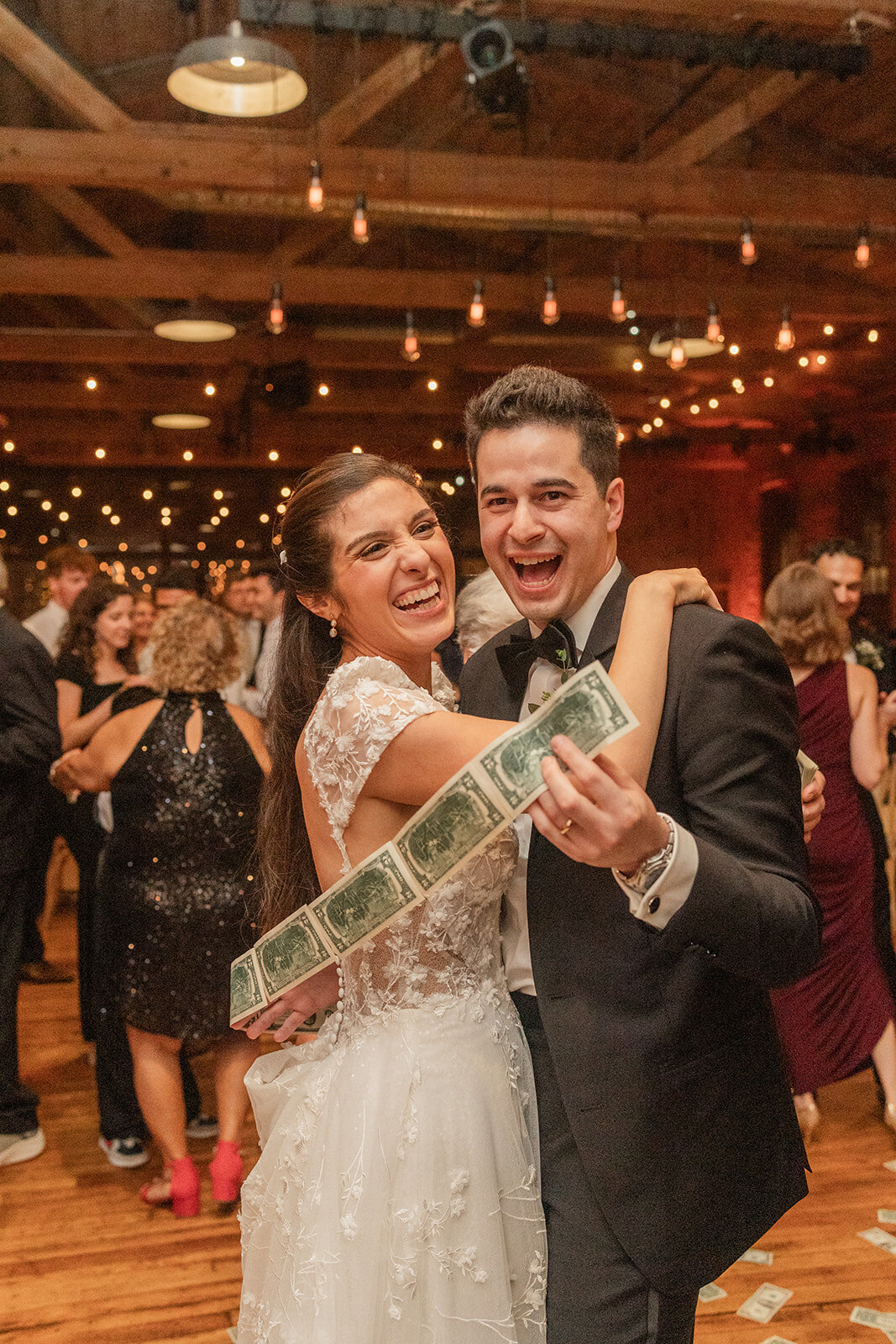 bride and groom enjoy cultural tradition during first dance