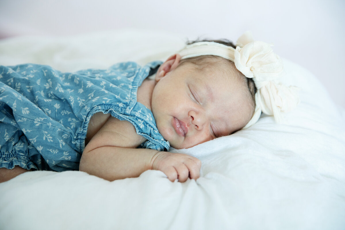 newborn baby girl with big bow