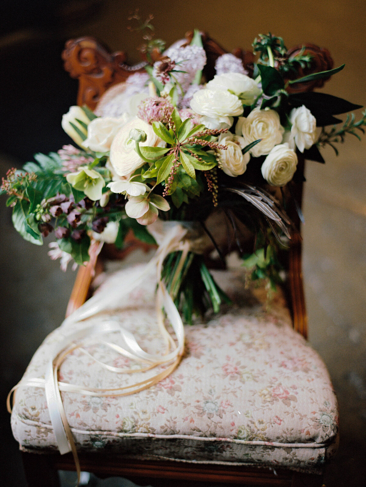 brides bouquet on a chair