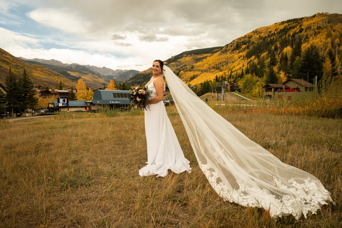 Bride poses before  her wedding ceremony in Vail Colorado.