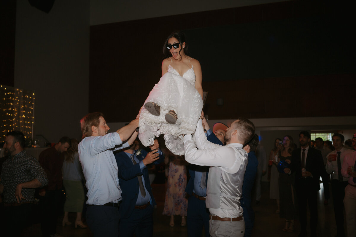 bride celebrating at alberta reception