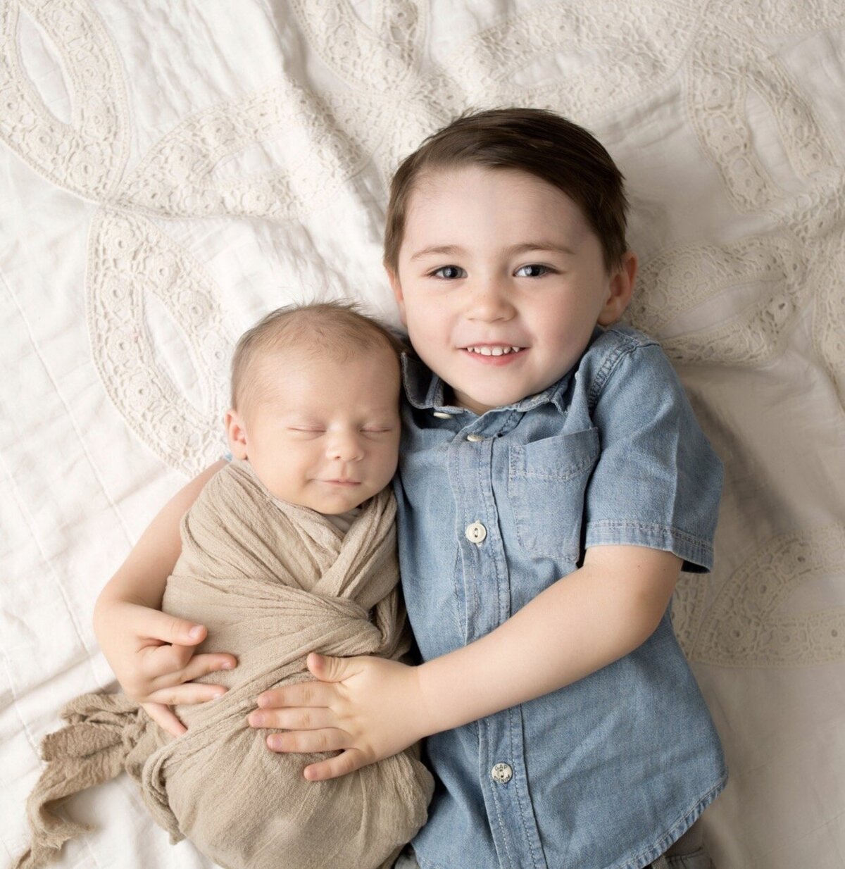 Newborn and sibling