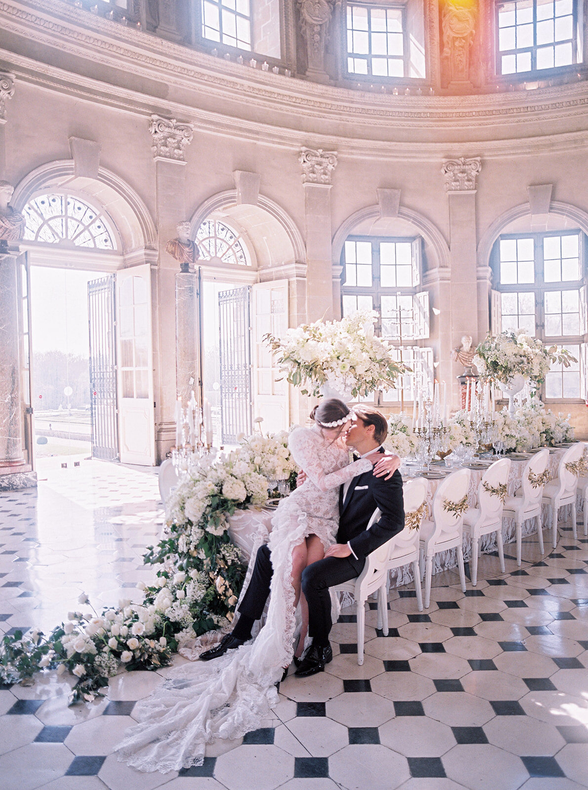 The photo at Chateau Vaux le Vicomte, one of the top destination wedding venues in France, was taken by photographer Audrey FORA. In addition to the photographer, East West Films Videographers also captured the beautiful scene.