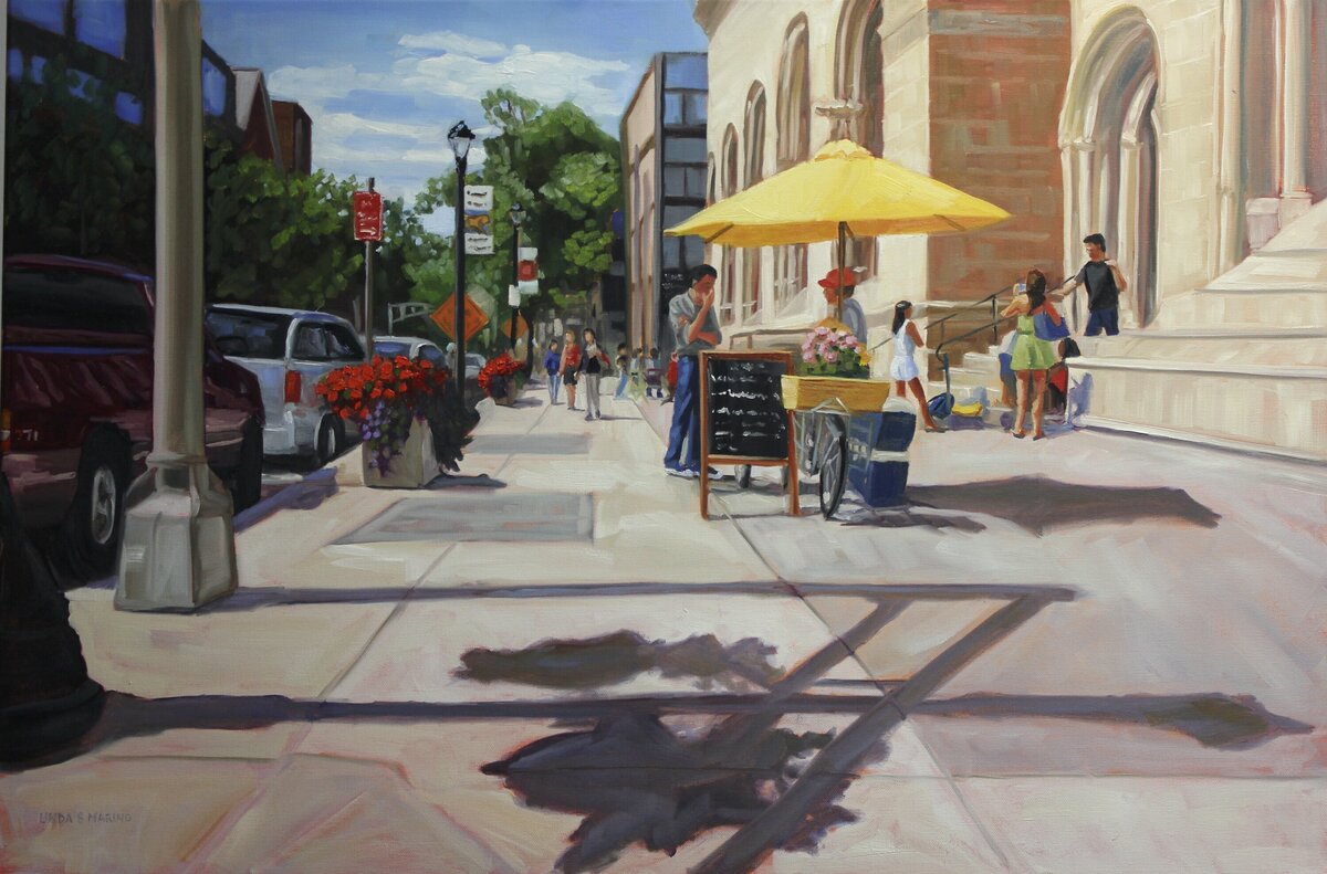 Painting of street in New Haven CT where street vendor with yellow umbrella is selling food to man, yale students in the background the building is Yale Art Gallery, 24 x 36" oil painting, by Linda Marino