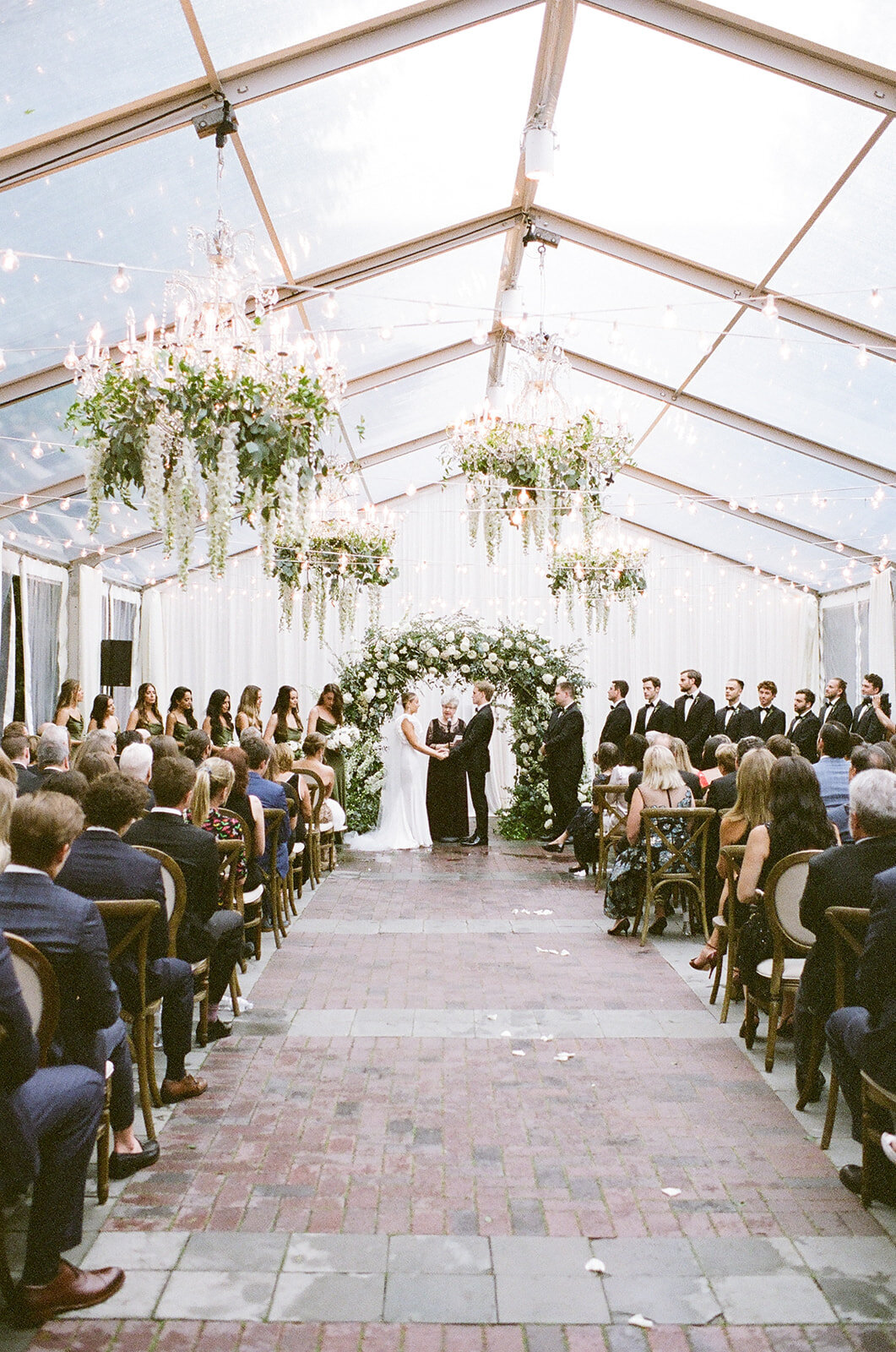 Chicago Illuminating Co. Tent Wedding with Lush Floral Arch_31
