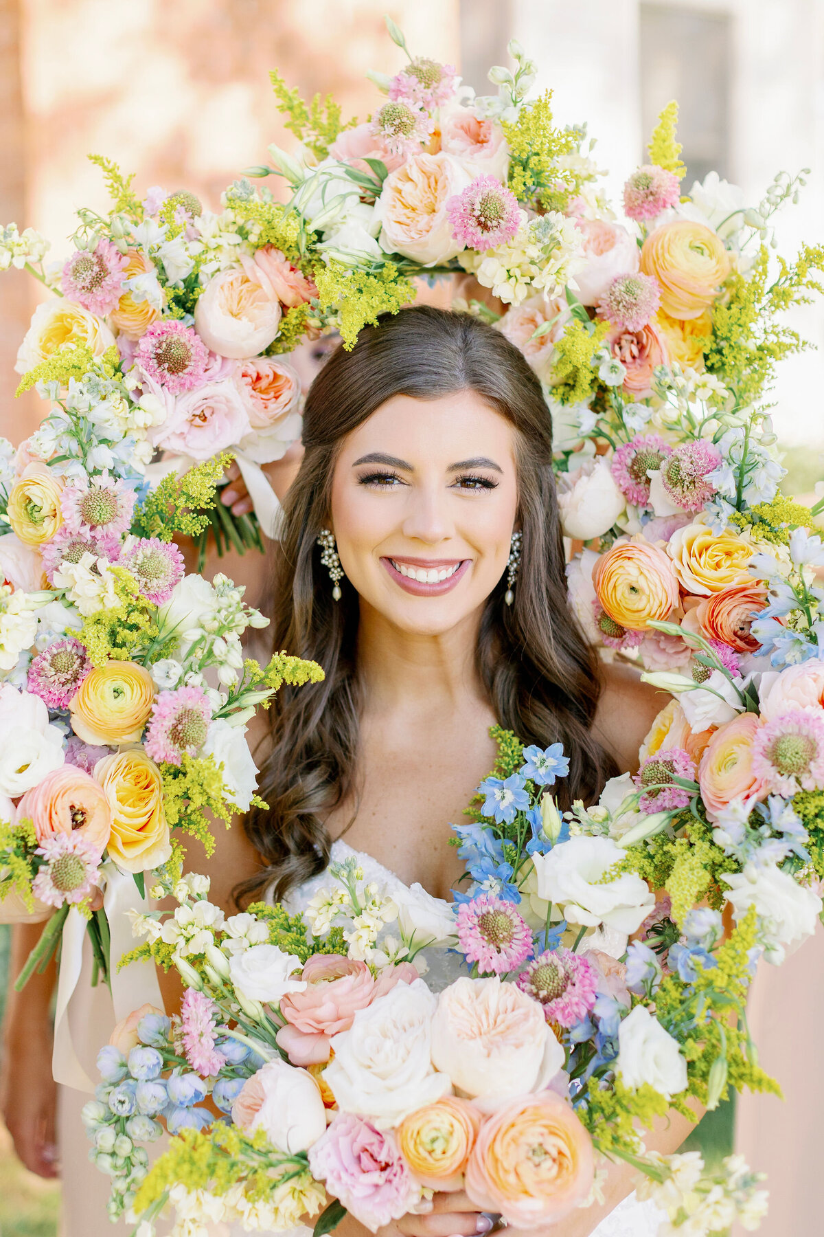 Colorful flowers around the bride