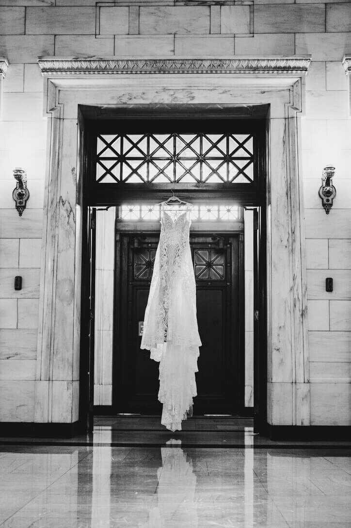 Beautiful wedding dress hanging in the doorway of the Dayton Masonic Temple